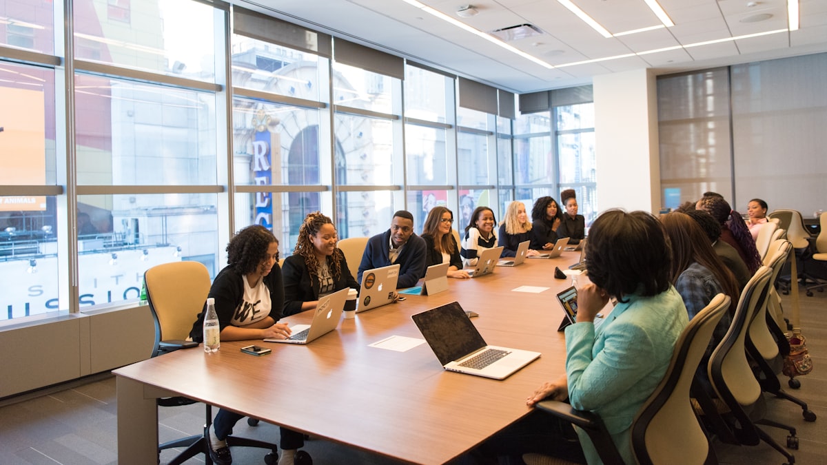 A team meeting around a table in an office