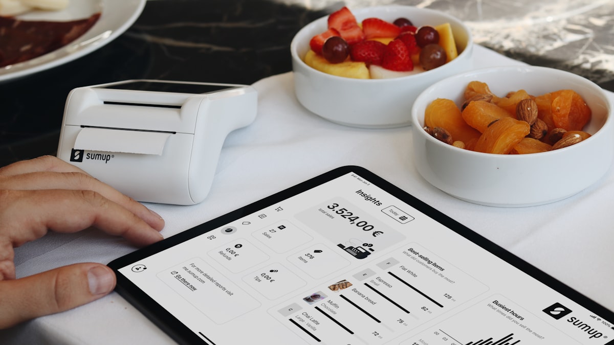 A tablet point-of-sale terminal at a restaurant counter